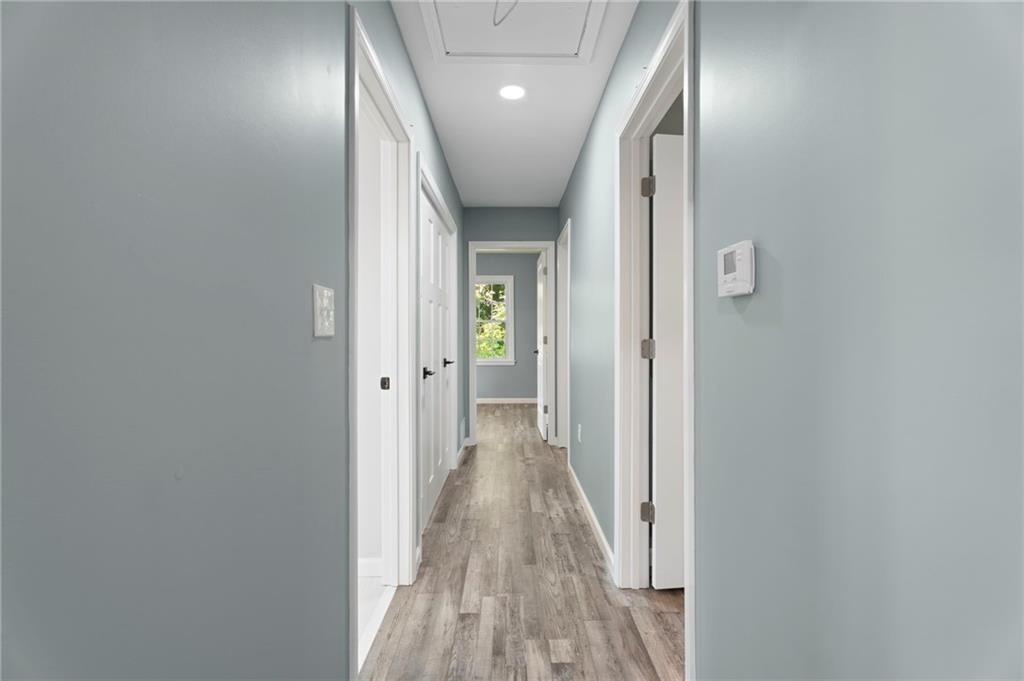 1939 Wee Kirk Road Southeast Atlanta, GA 30316 - Photo 21 of 43 a view of hallway with wooden floor