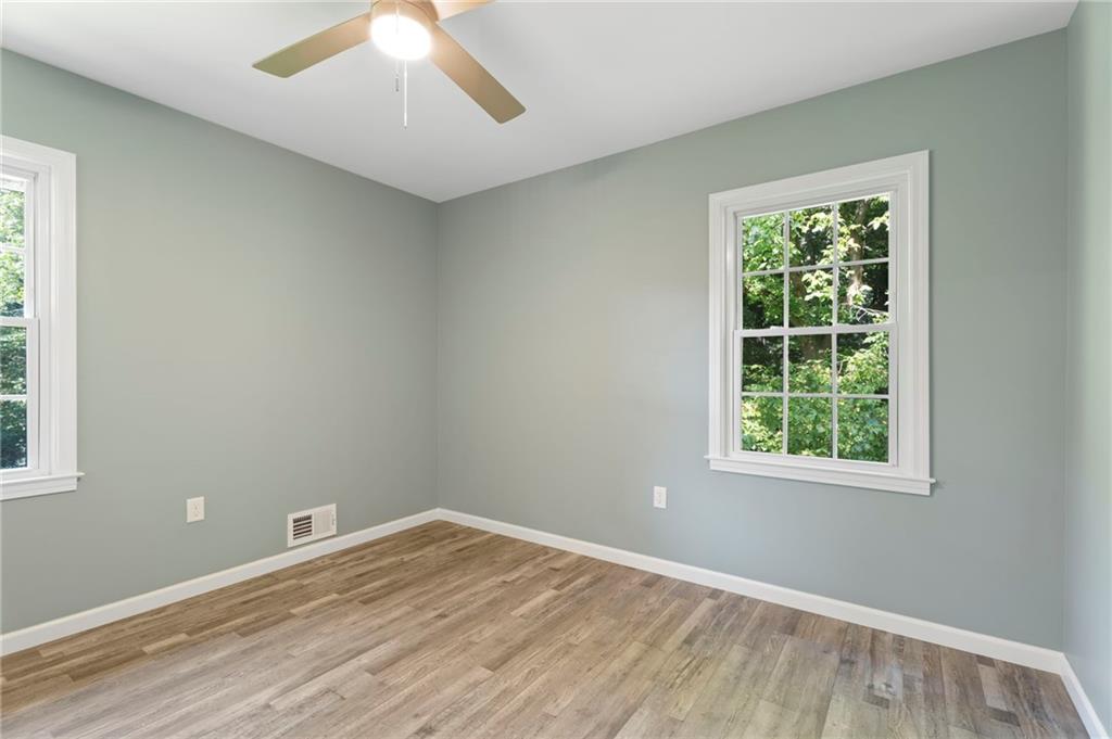 1939 Wee Kirk Road Southeast Atlanta, GA 30316 - Photo 31 of 43 an empty room with a window