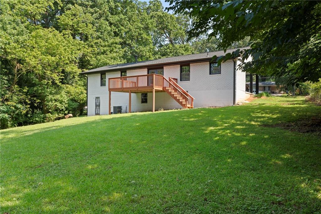 1939 Wee Kirk Road Southeast Atlanta, GA 30316 - Photo 38 of 43 a view of a house with a yard