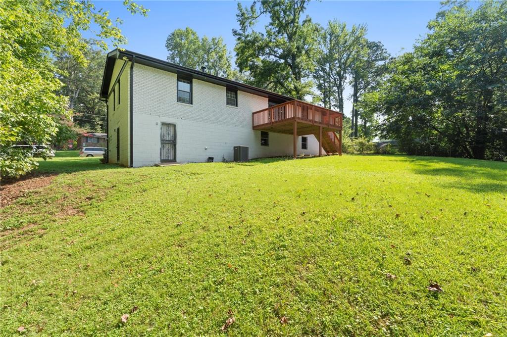 1939 Wee Kirk Road Southeast Atlanta, GA 30316 - Photo 40 of 43 a view of a house with a yard