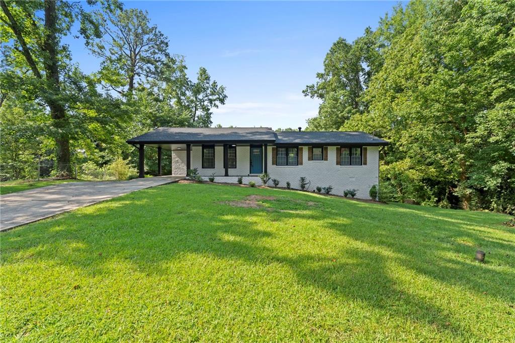 1939 Wee Kirk Road Southeast Atlanta, GA 30316 - Photo 5 of 43 a view of house with yard and green space