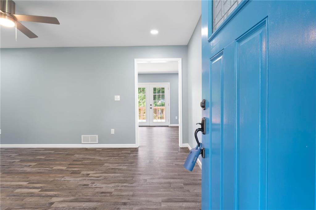1939 Wee Kirk Road Southeast Atlanta, GA 30316 - Photo 9 of 43 a view of livingroom with hardwood floor and hallway