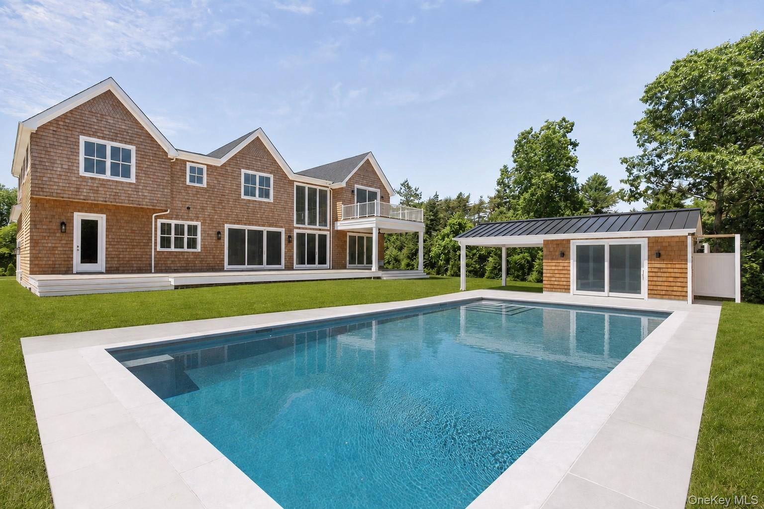 34 Old Main Road Quogue, NY 11959 - Photo 3 of 27 Back with Pool and Pool House