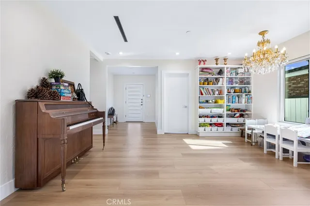 a kitchen with furniture and a stove