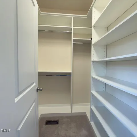 a bathroom with a shower and a sink