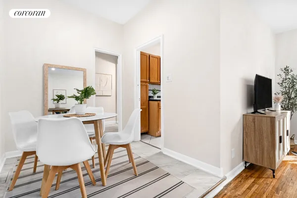 a kitchen with stainless steel appliances granite countertop a sink a stove and cabinets