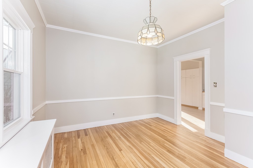 160 Cedar Street Lexington, MA 02421 - Photo 4 of 27 a view of a room with wooden floor and windows
