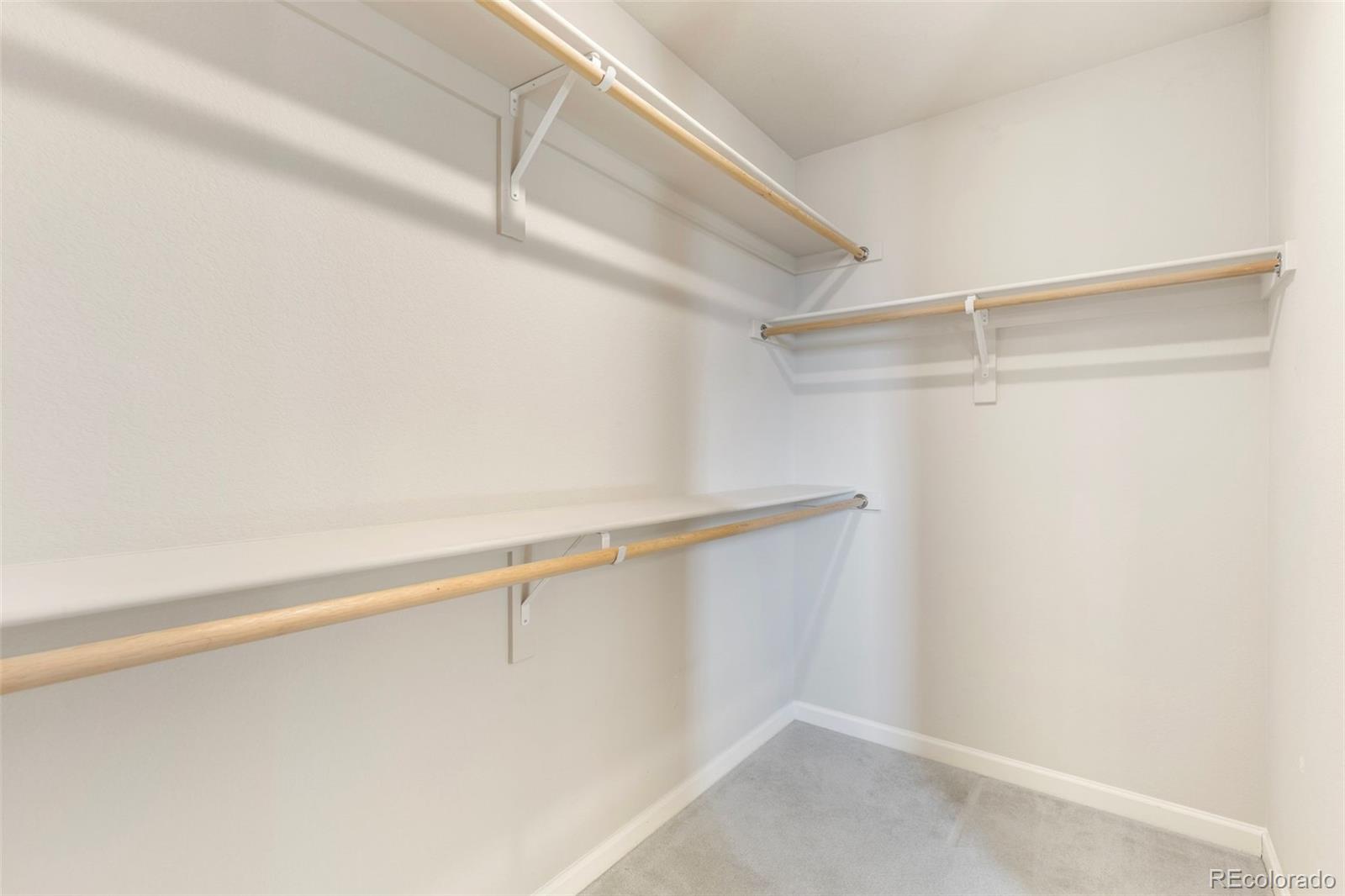 2771 Big Empty Place Berthoud, CO 80513 - Photo 16 of 25 a view of a room with racks on the wall