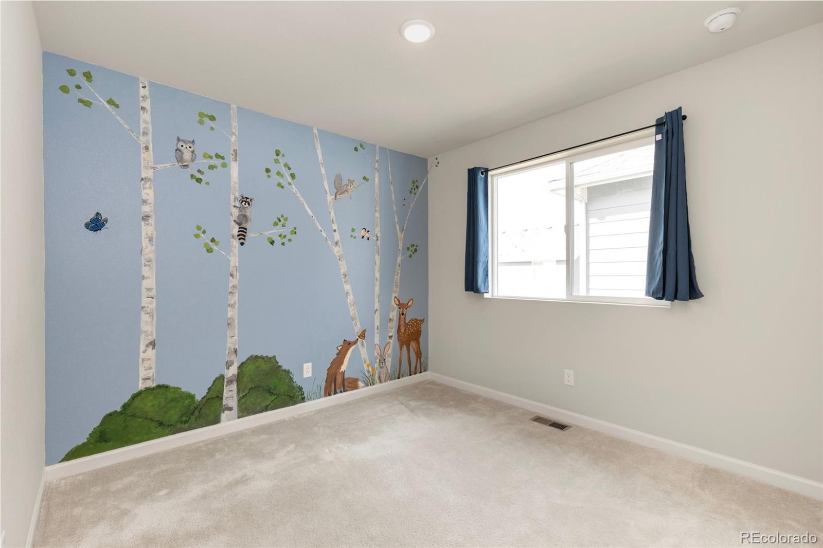 2771 Big Empty Place Berthoud, CO 80513 - Photo 17 of 25 a view of a bathroom with a window and a shower