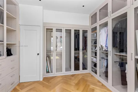 a view of a bedroom with furniture and staircase