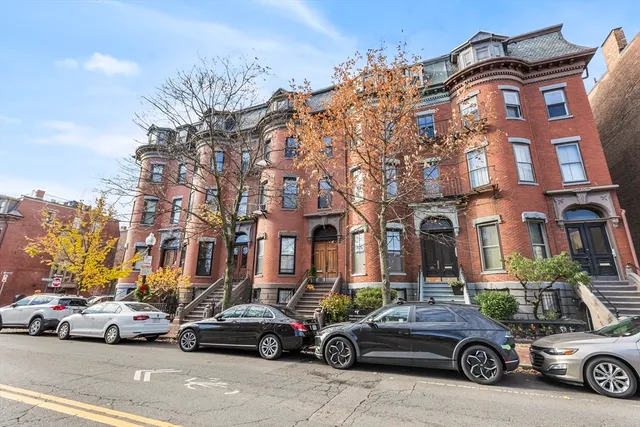 a car parked in front of a building