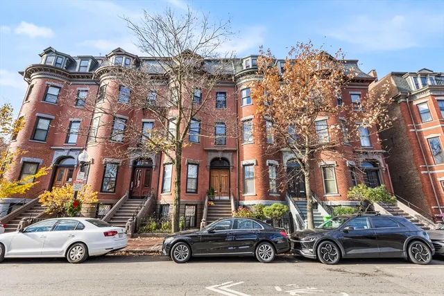 a car parked in front of a building