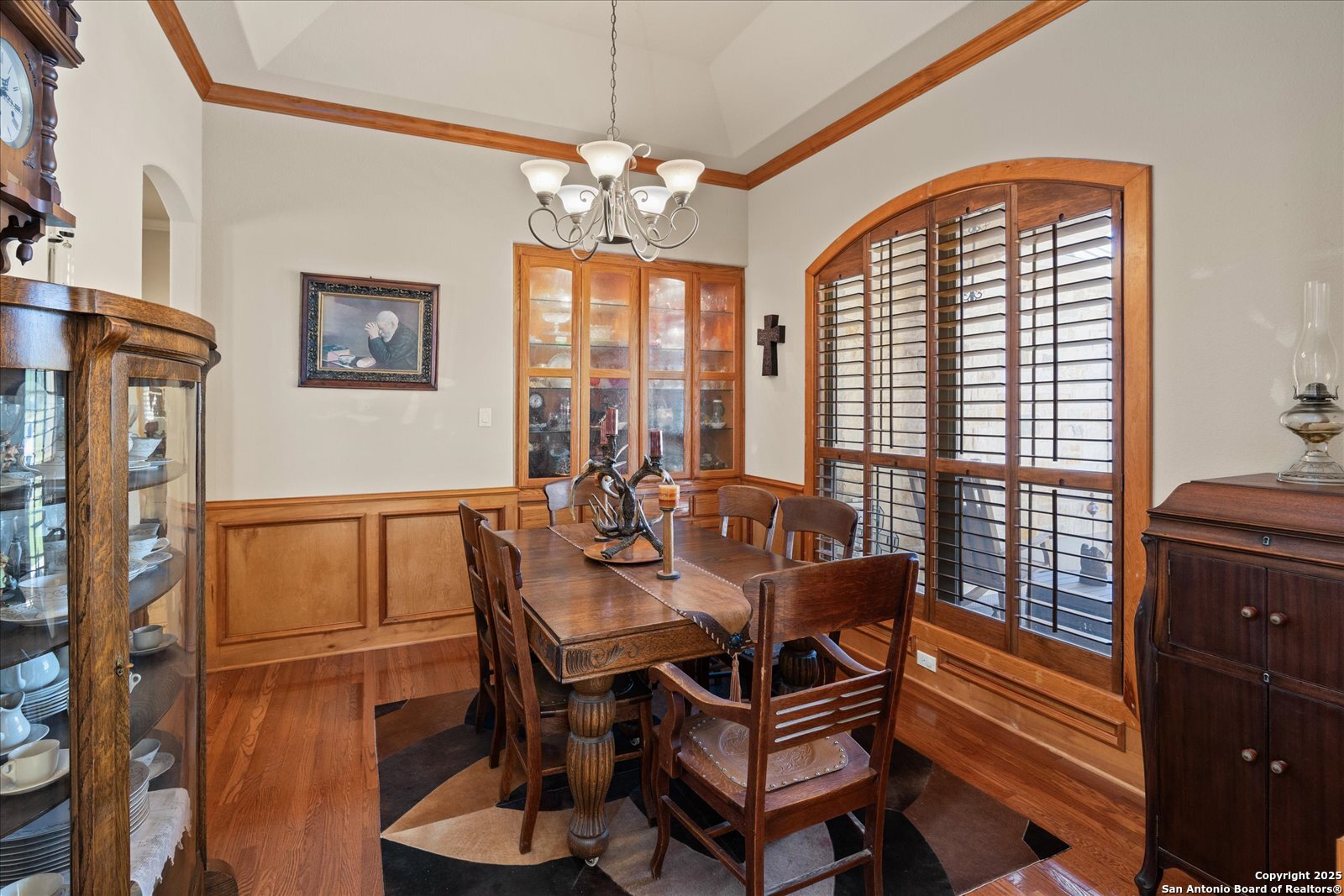 34 Cravey Road Boerne, TX 78006 - Photo 23 of 69 a dining room with furniture a chandelier and wooden floor