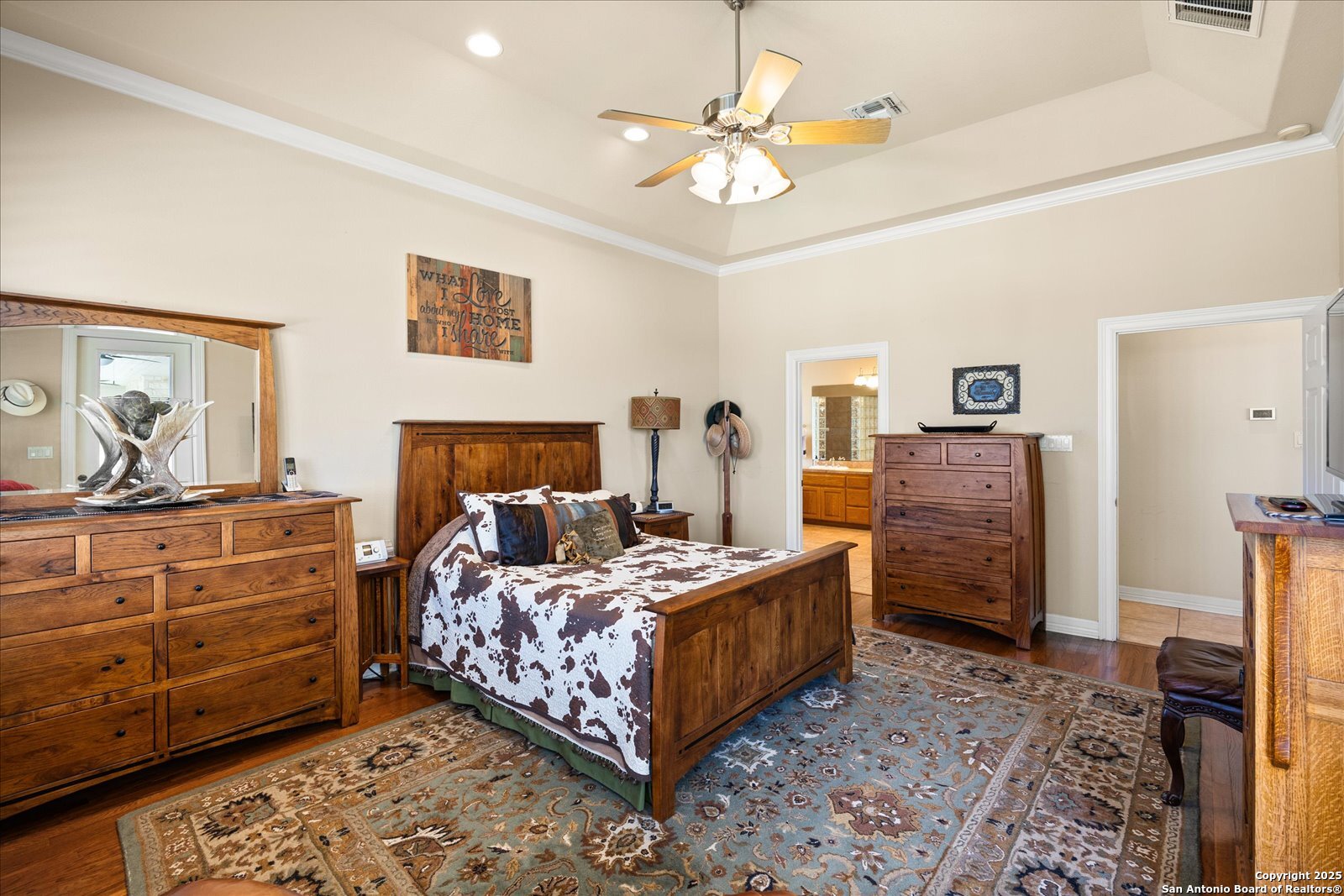 34 Cravey Road Boerne, TX 78006 - Photo 26 of 69 a bedroom with a bed and dresser