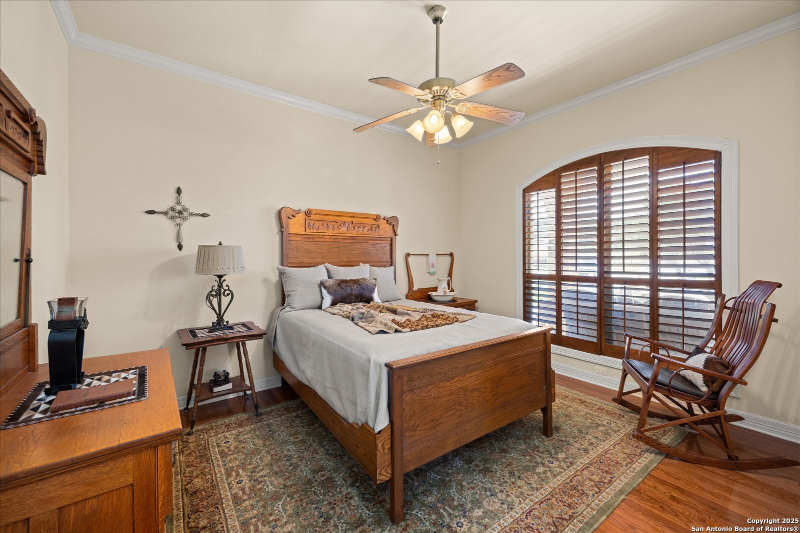 34 Cravey Road Boerne, TX 78006 - Photo 30 of 69 a bedroom with a bed and a desk