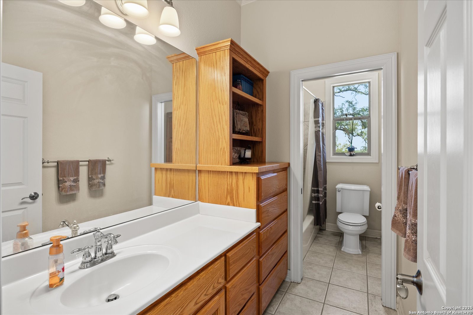 34 Cravey Road Boerne, TX 78006 - Photo 31 of 69 a bathroom with a sink a toilet and shower