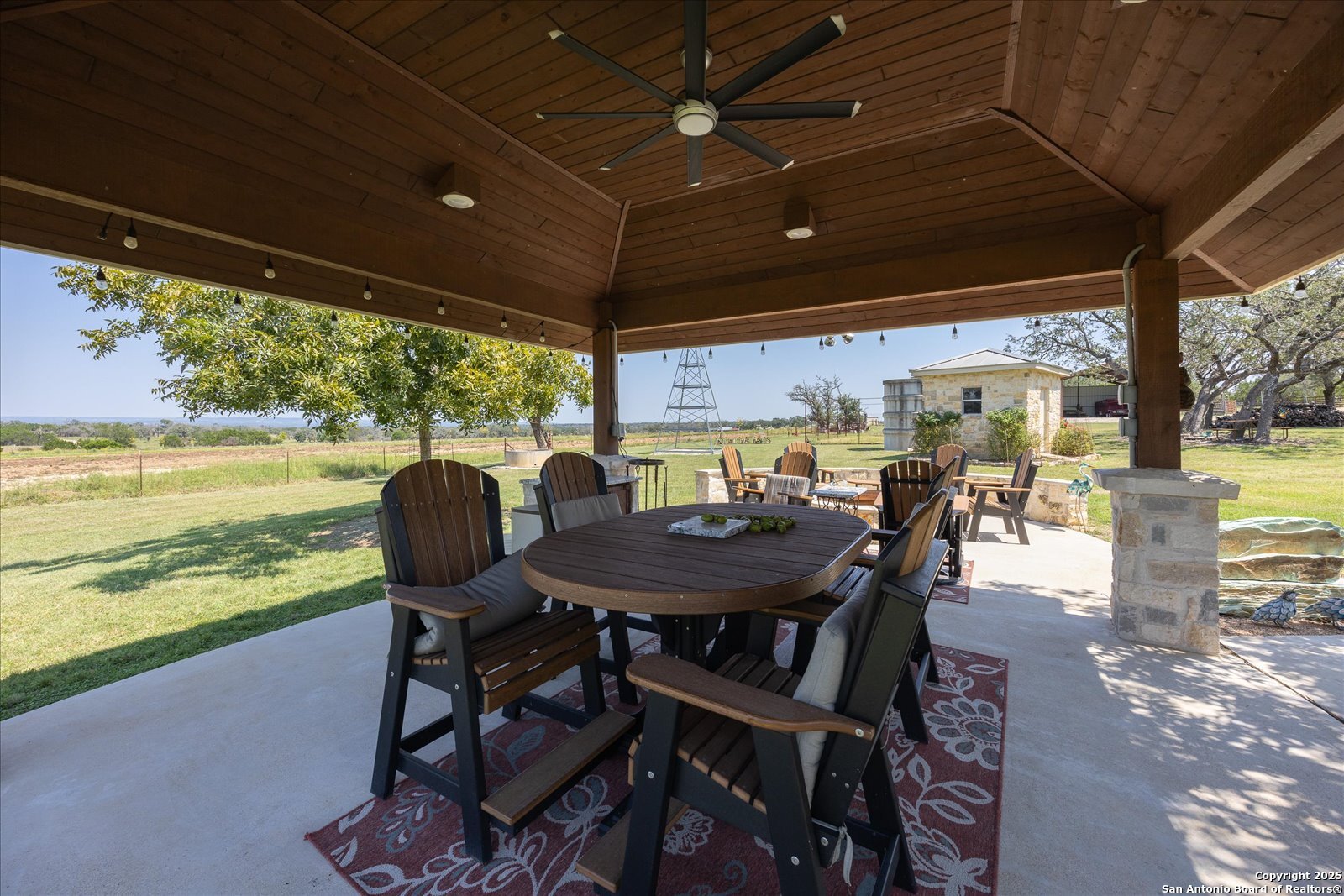 34 Cravey Road Boerne, TX 78006 - Photo 41 of 69 a view of a table and chairs in patio