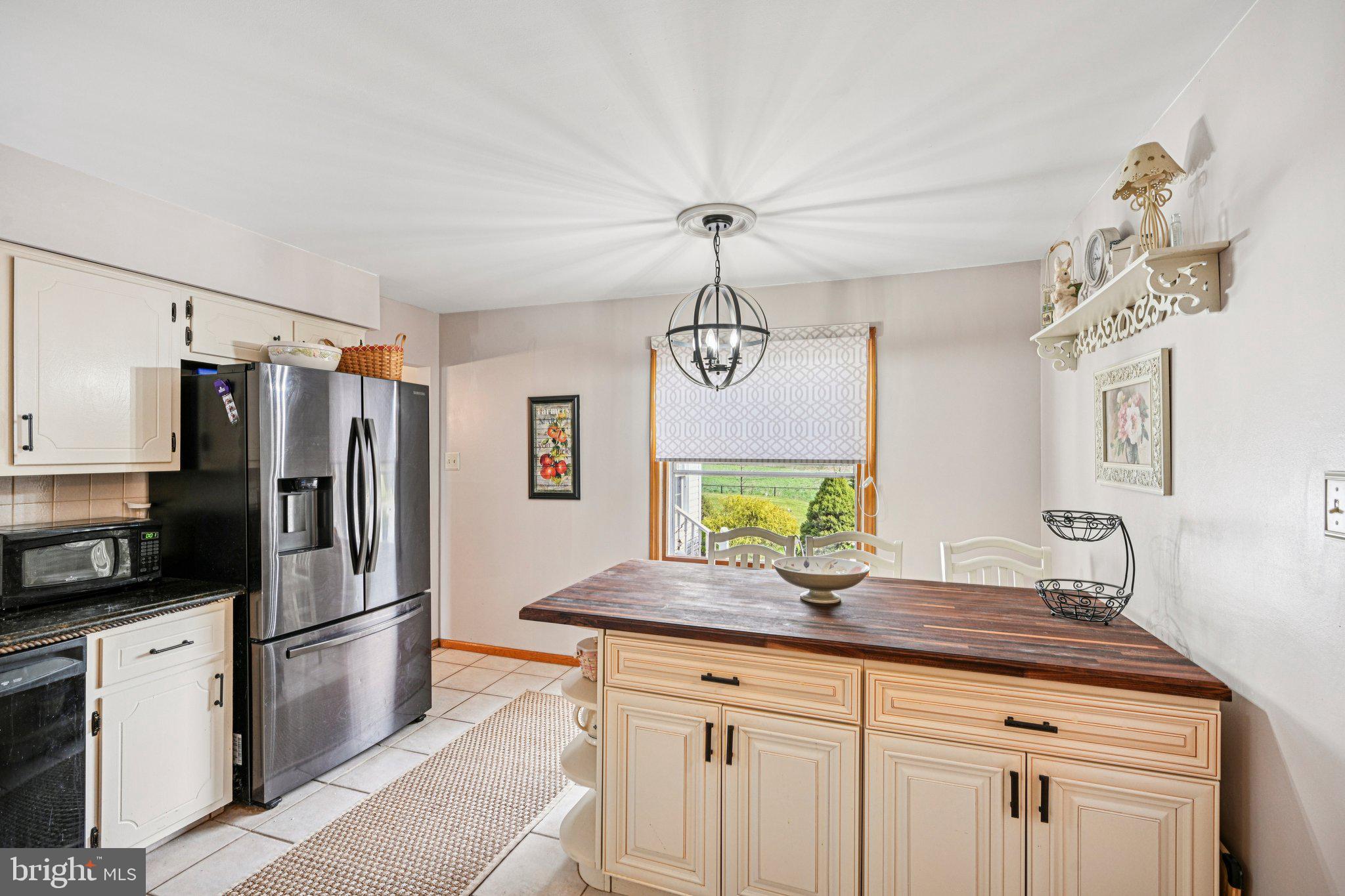 25618 Mt Pleasant Road Columbus, NJ 08022 - Photo 18 of 61 a kitchen with stainless steel appliances a sink and a refrigerator