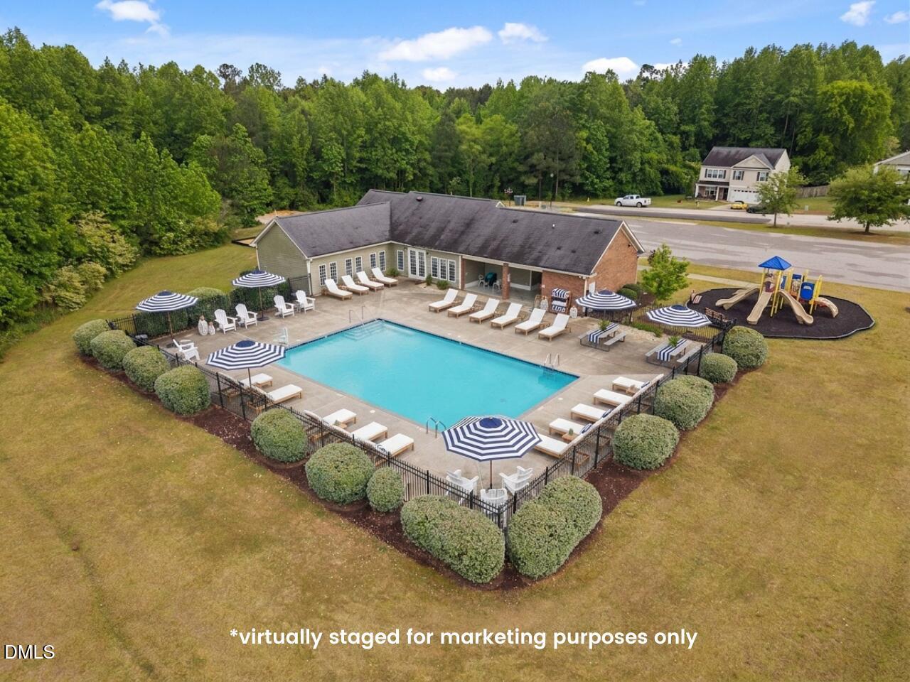 45 Crane Way Bunnlevel, NC 28323 - Photo 3 of 35 a view of a swimming pool with a yard