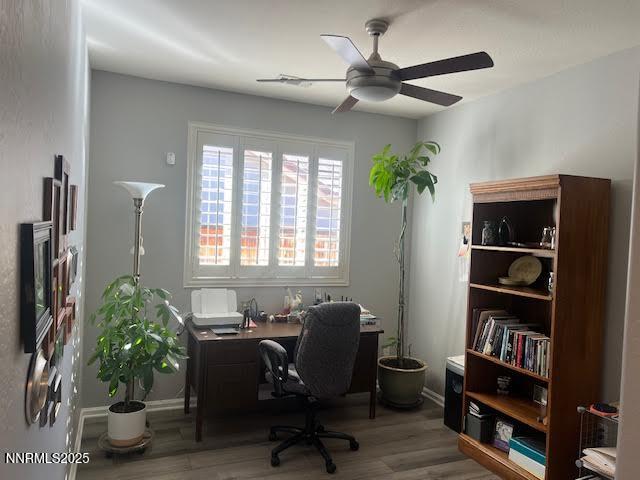 1220 Cliff Park Way Reno, NV 89523 - Photo 13 of 17 a view of a workspace with furniture and a potted plant