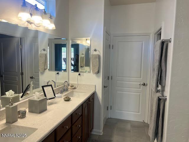 1220 Cliff Park Way Reno, NV 89523 - Photo 10 of 17 a bathroom with a sink and a mirror
