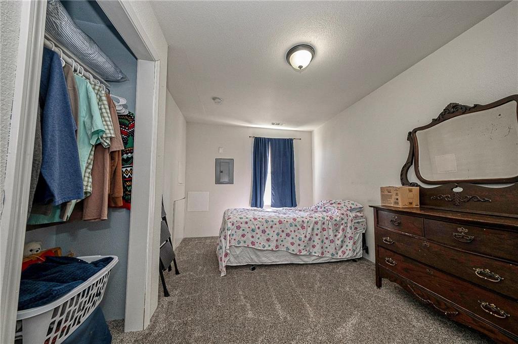 249 Washington Road, Unit 3 Waynesburg, PA 15370 - Photo 6 of 10 a bedroom with a bed and a dresser