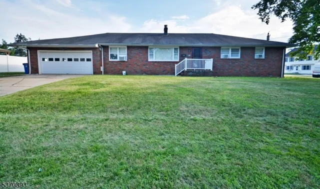 a house view with a garden space