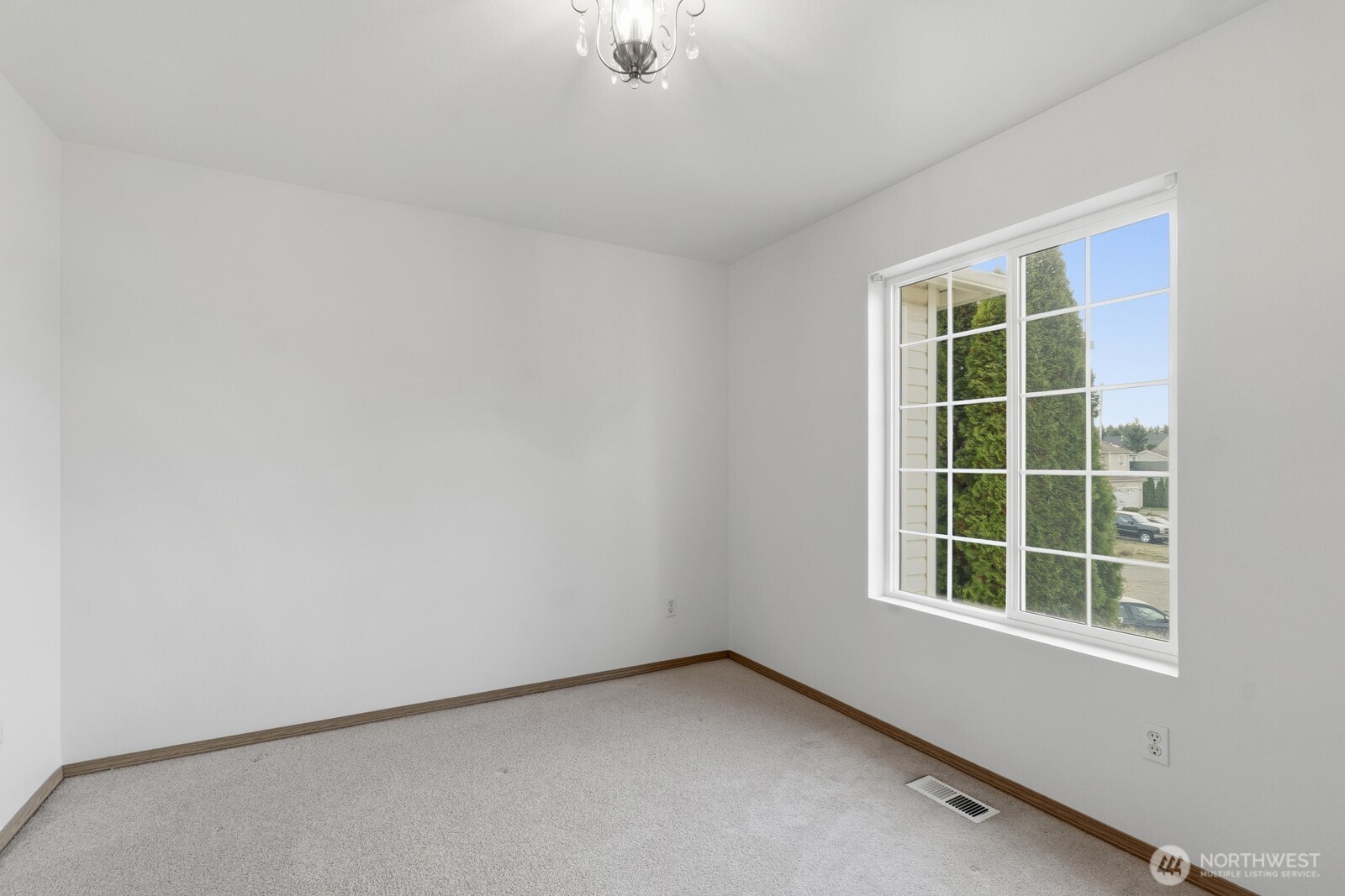 14905 Prairie Vista Loop Southeast Yelm, WA 98597 - Photo 17 of 40 a view of an empty room with a window