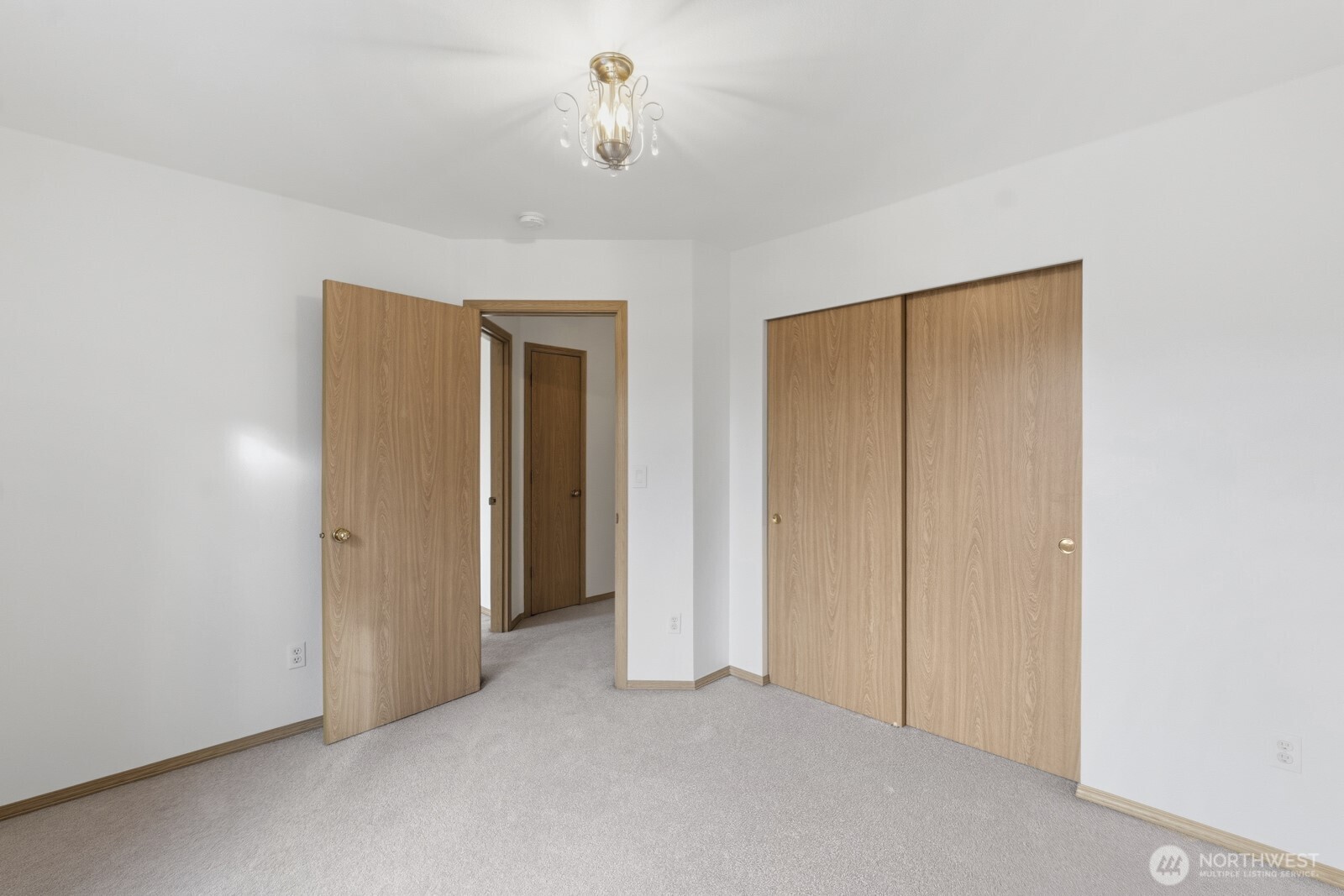 14905 Prairie Vista Loop Southeast Yelm, WA 98597 - Photo 18 of 40 a view of a room with a chandelier
