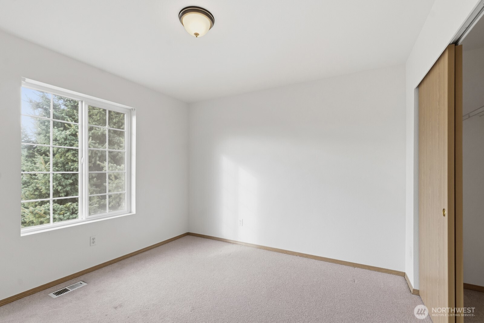 14905 Prairie Vista Loop Southeast Yelm, WA 98597 - Photo 19 of 40 an empty room with windows