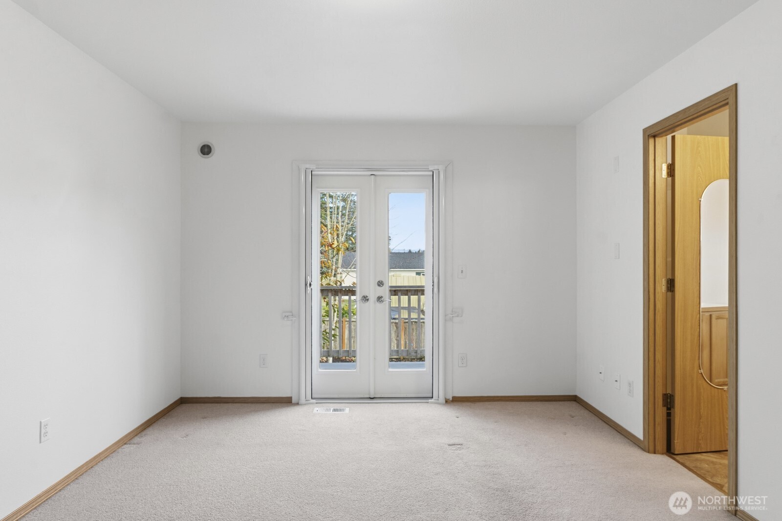 14905 Prairie Vista Loop Southeast Yelm, WA 98597 - Photo 21 of 40 an empty room with windows