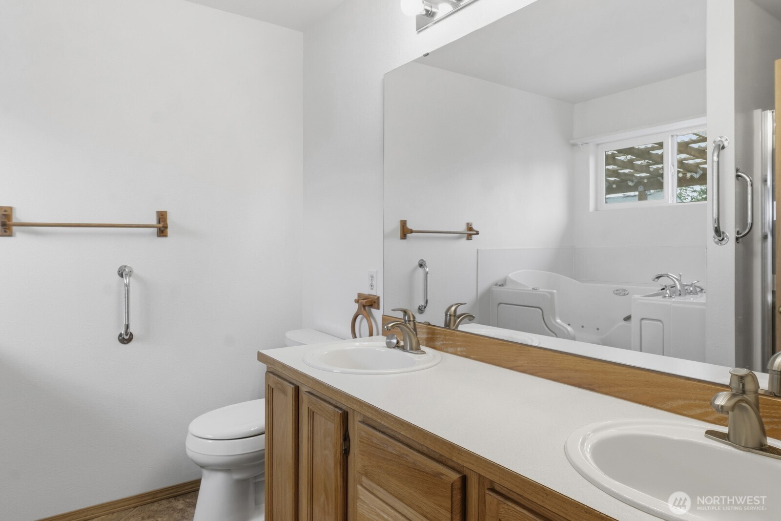 14905 Prairie Vista Loop Southeast Yelm, WA 98597 - Photo 24 of 40 a bathroom with a sink and a toilet