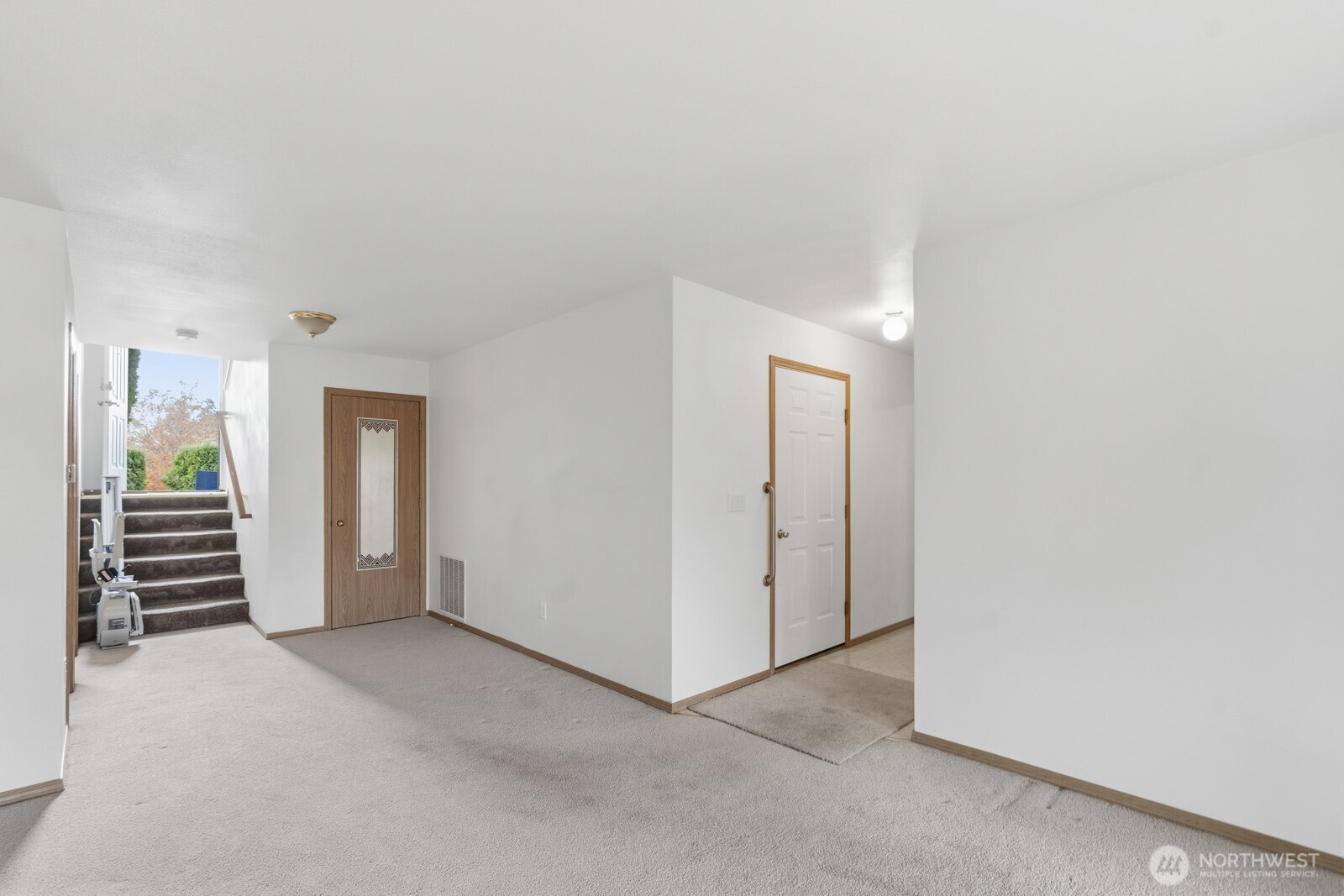 14905 Prairie Vista Loop Southeast Yelm, WA 98597 - Photo 31 of 40 an empty room with closet and mirrors