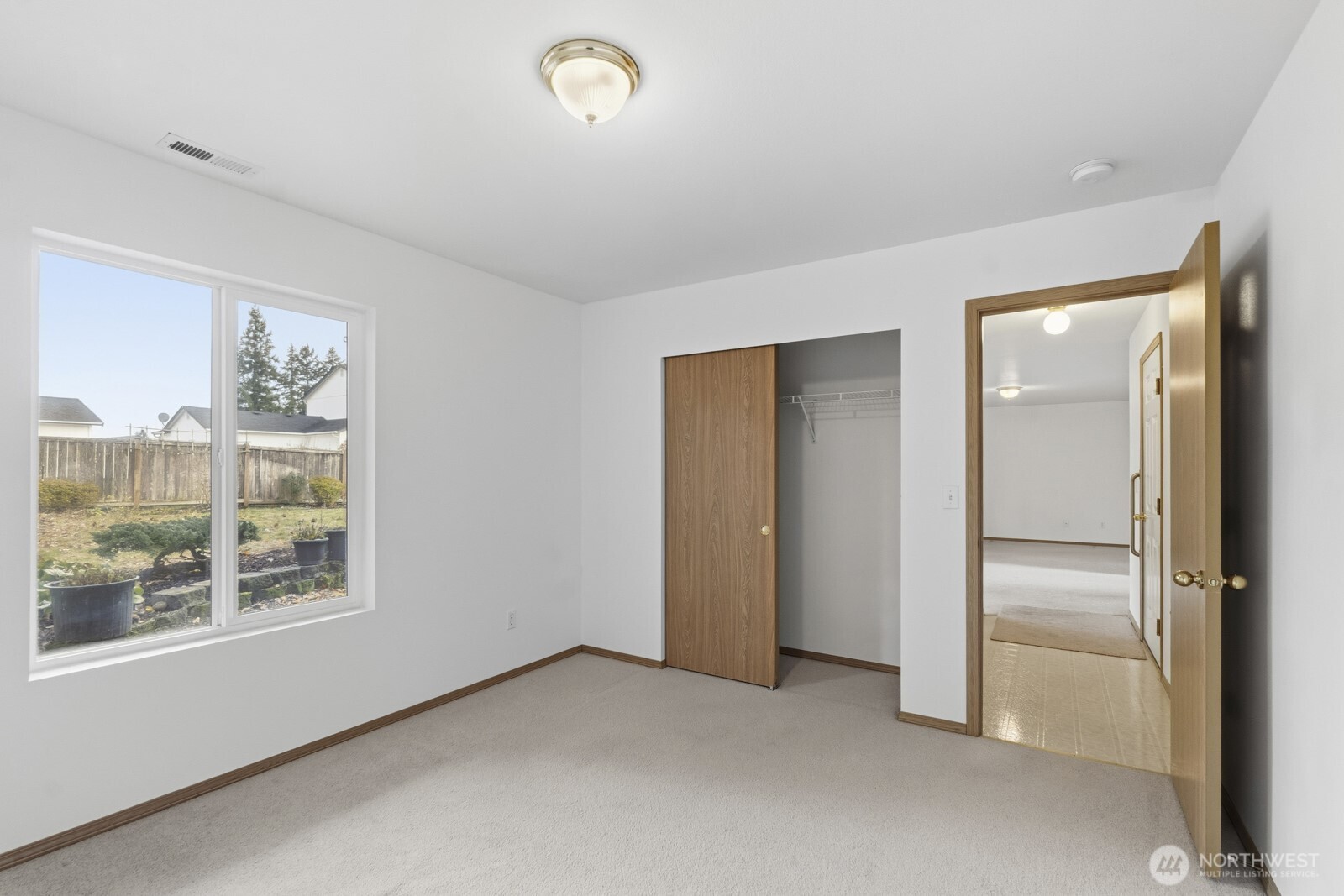 14905 Prairie Vista Loop Southeast Yelm, WA 98597 - Photo 33 of 40 an empty room with windows