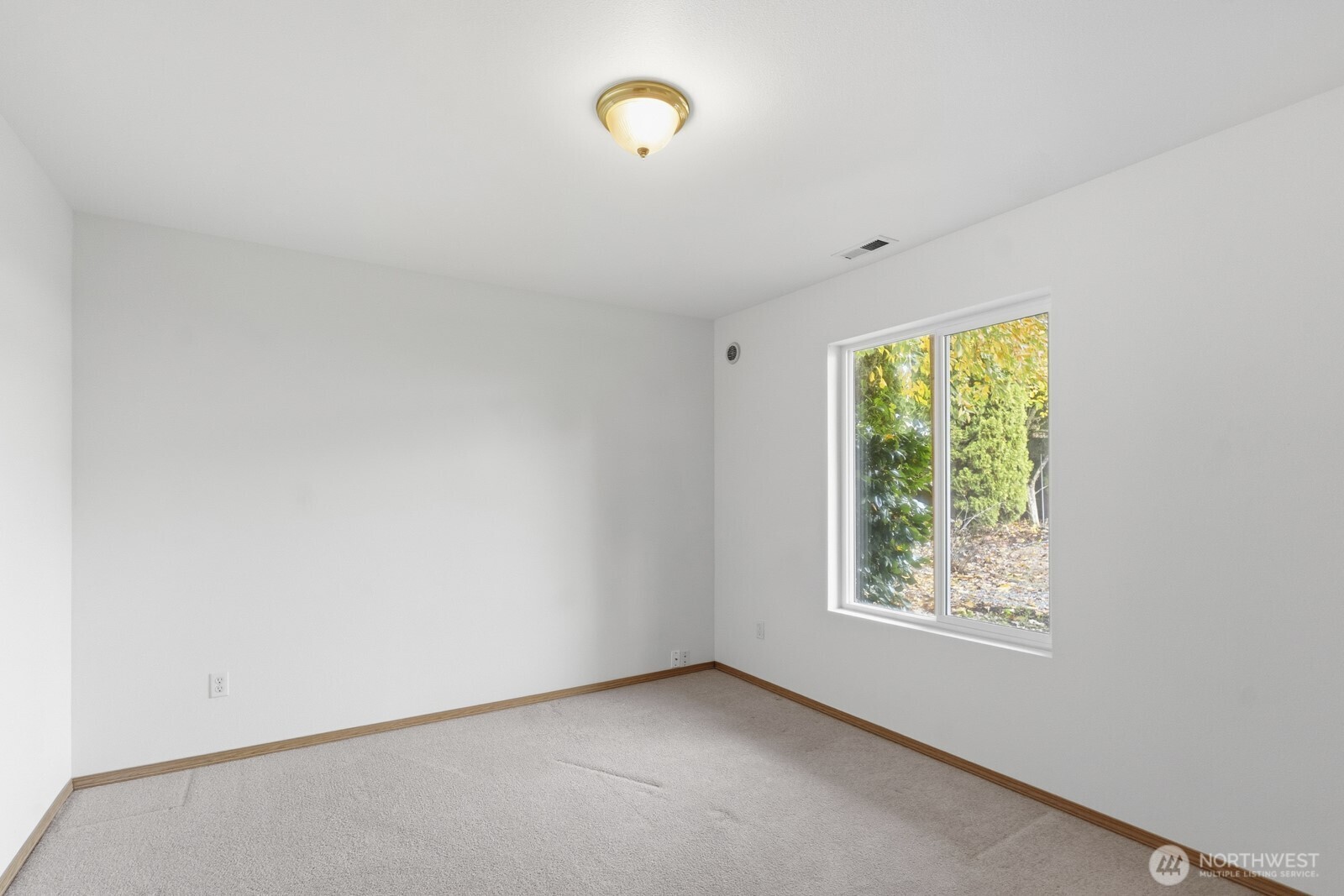 14905 Prairie Vista Loop Southeast Yelm, WA 98597 - Photo 34 of 40 an empty room with windows