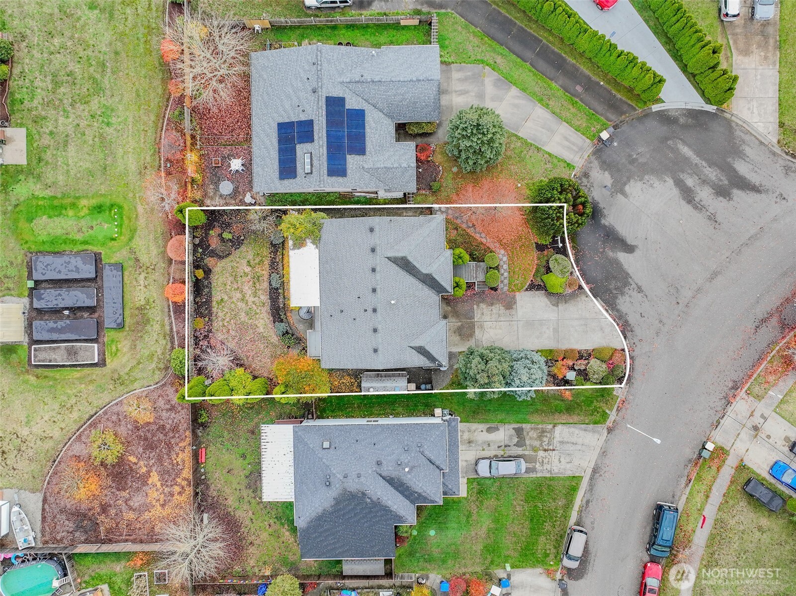 14905 Prairie Vista Loop Southeast Yelm, WA 98597 - Photo 40 of 40 an aerial view of a house with a garden and a yard