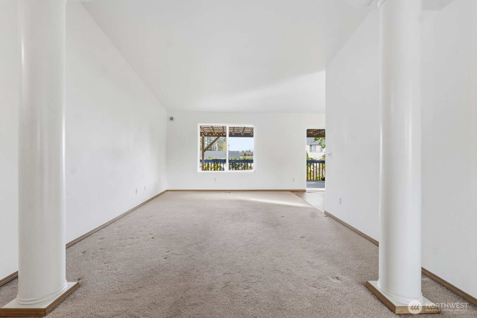 14905 Prairie Vista Loop Southeast Yelm, WA 98597 - Photo 4 of 40 an empty room with windows