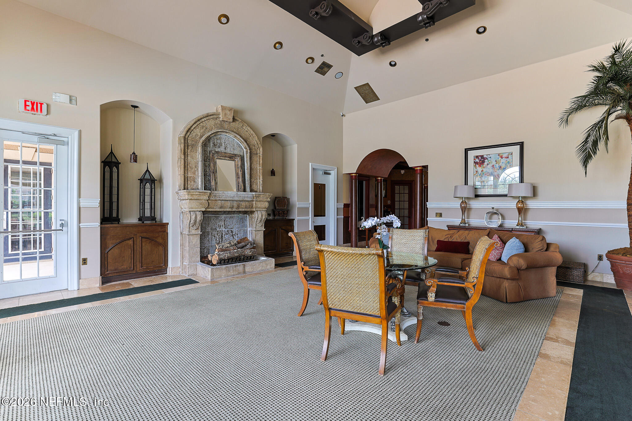 10961 Burnt Mill Road, Unit 426 Jacksonville, FL 32256 - Photo 19 of 24 a living room with furniture and a fireplace