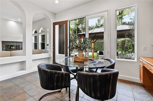 a kitchen with stainless steel appliances kitchen island granite countertop a sink and cabinets