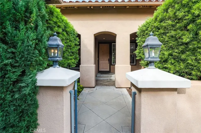 a lobby with furniture and a view of living room