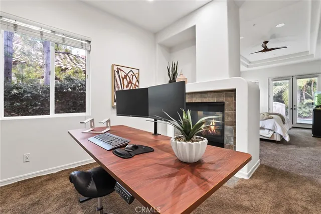 a spacious bathroom with a double vanity sink mirror and bathtub