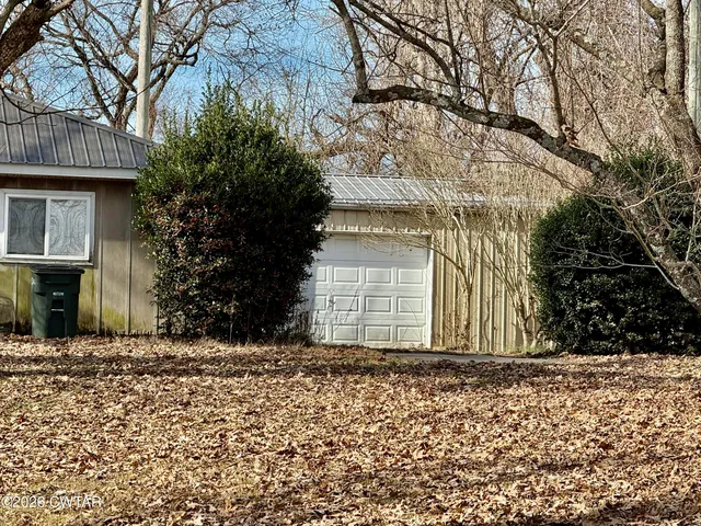 a front view of house with yard