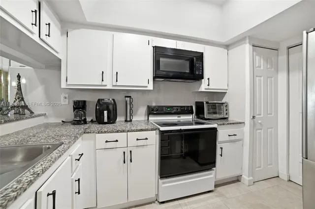 $419,999 | 6400 Southwest 138th Court, Unit 203, Miami, FL 33183