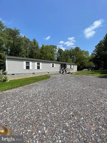 a view of a yard with an outdoor space