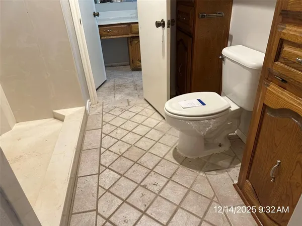 a bathroom with a sink and a toilet