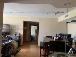 a view of a workspace with furniture