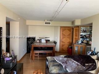 1688 West Avenue, Unit 405 Miami Beach, FL 33139 - Photo 18 of 23 a room with furniture a rug and a window