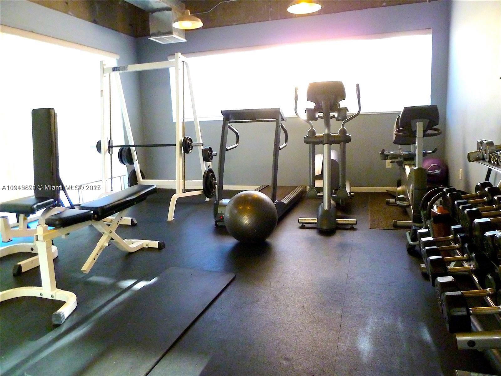 1688 West Avenue, Unit 405 Miami Beach, FL 33139 - Photo 21 of 23 a view of a room with gym equipment