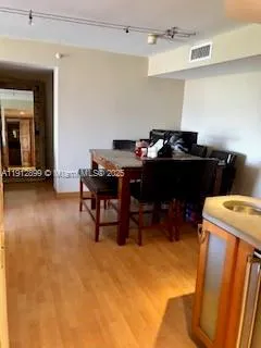 a view of a workspace with furniture