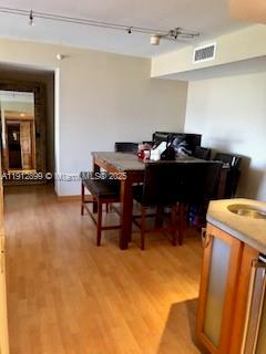 1688 West Avenue, Unit 405 Miami Beach, FL 33139 - Photo 5 of 23 a view of a workspace with furniture